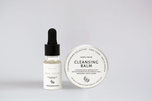 Manna and Me travel-size Cleansing Balm and Fortify Skin Serum set for barrier repair.