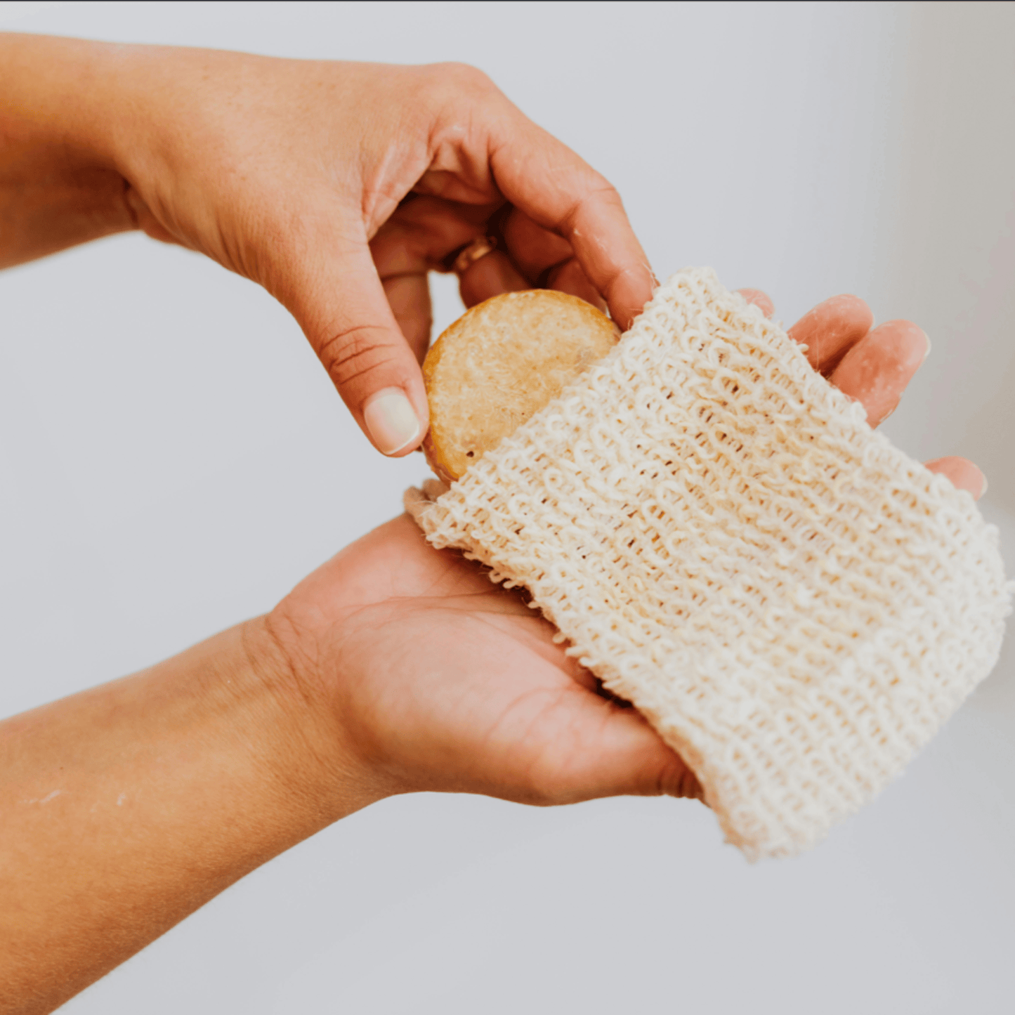 Eco-friendly natural fiber Soap Saver pouch for extending cold-process artisanal soap life.