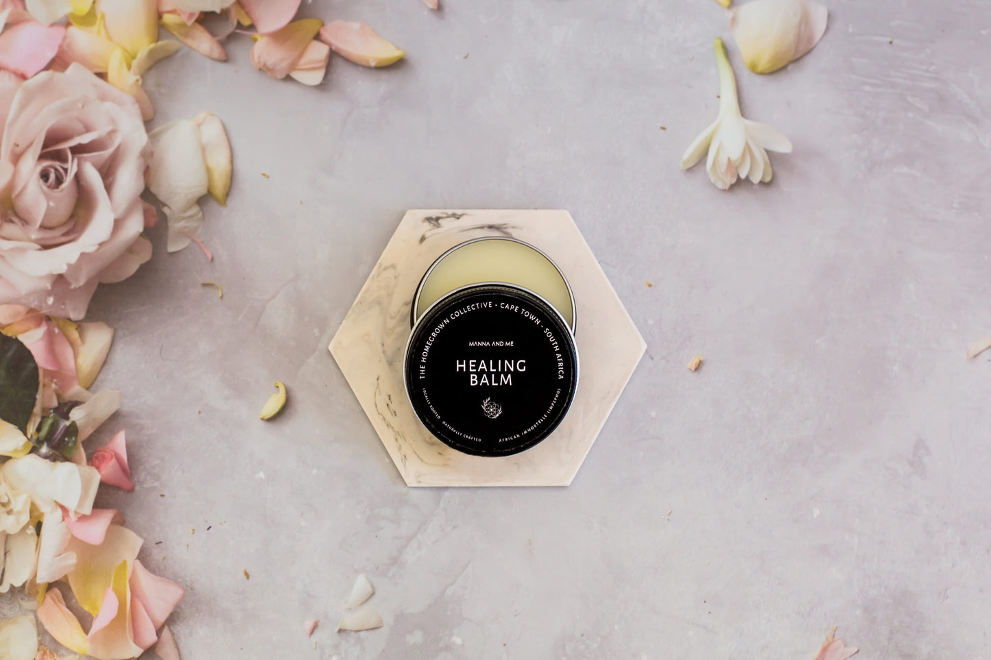 Manna and Me intensive Healing Balm tin, natural soothing salve for dry skin patches and irritations.