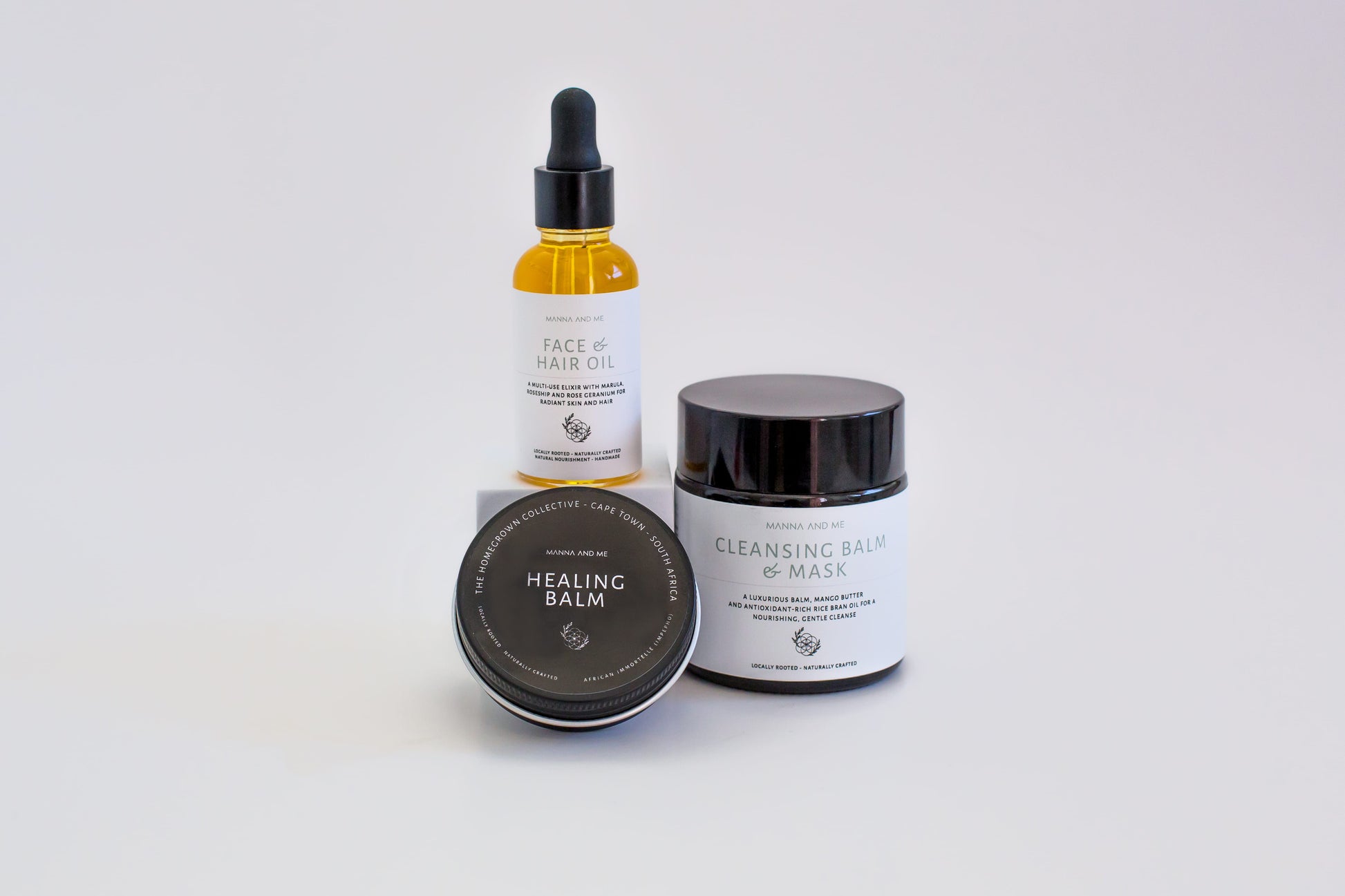 Manna and Me concentrated Face & Hair Oil dropper bottle, restorative South African botanical blend.