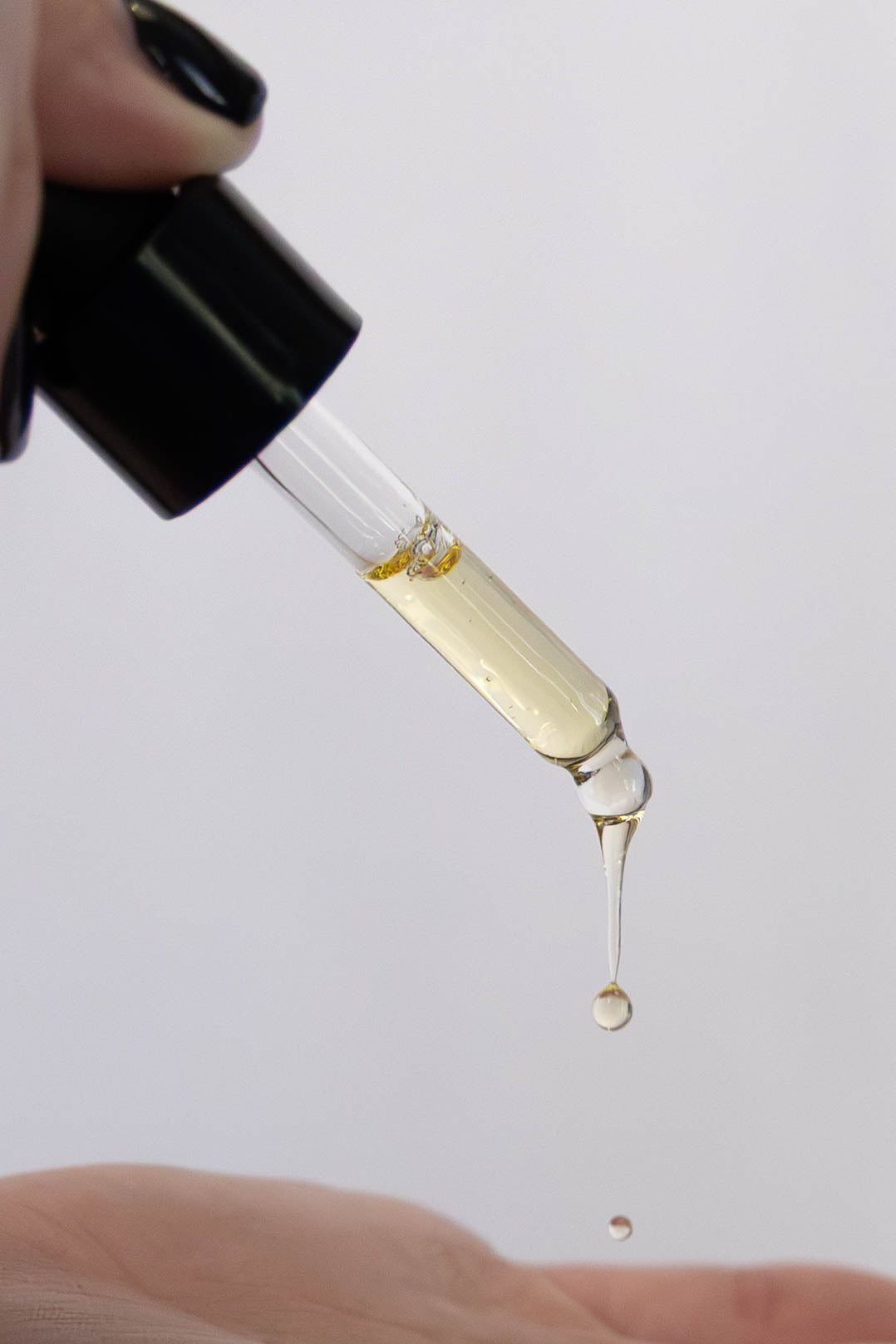 Manna and Me concentrated Face & Hair Oil dropper bottle, restorative South African botanical blend.