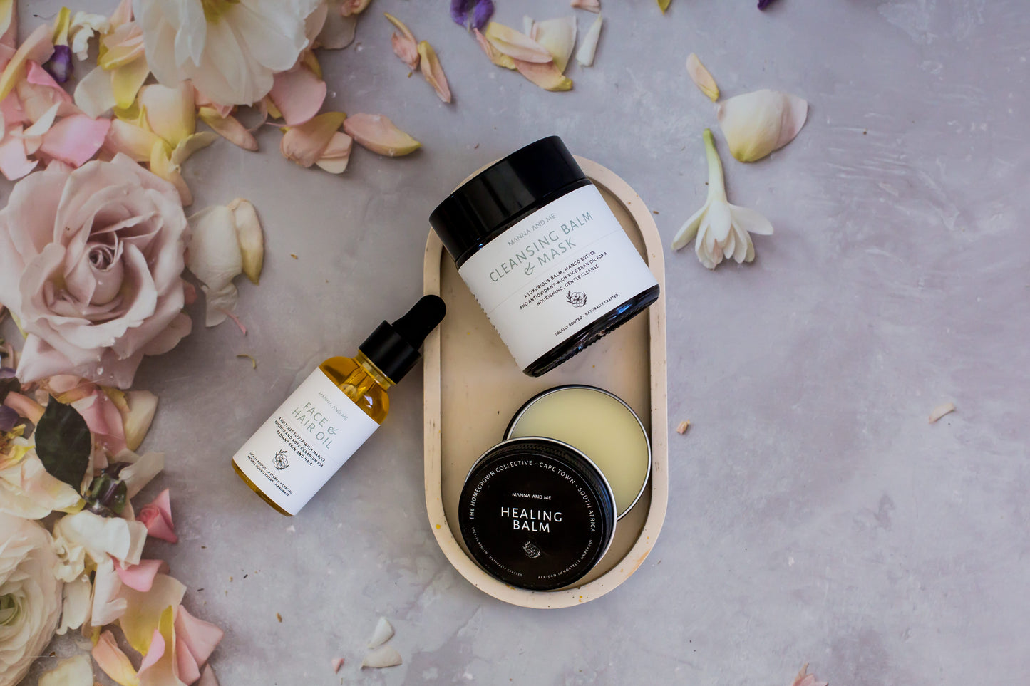 Manna and Me concentrated Face & Hair Oil dropper bottle, restorative South African botanical blend.