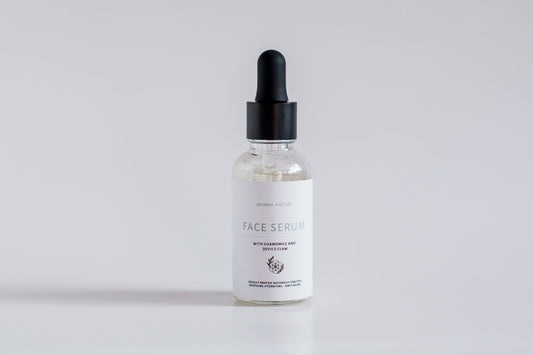 Manna and Me Fortify Skin Serum amber glass bottle with dropper, concentrated botanical formula for barrier repair.