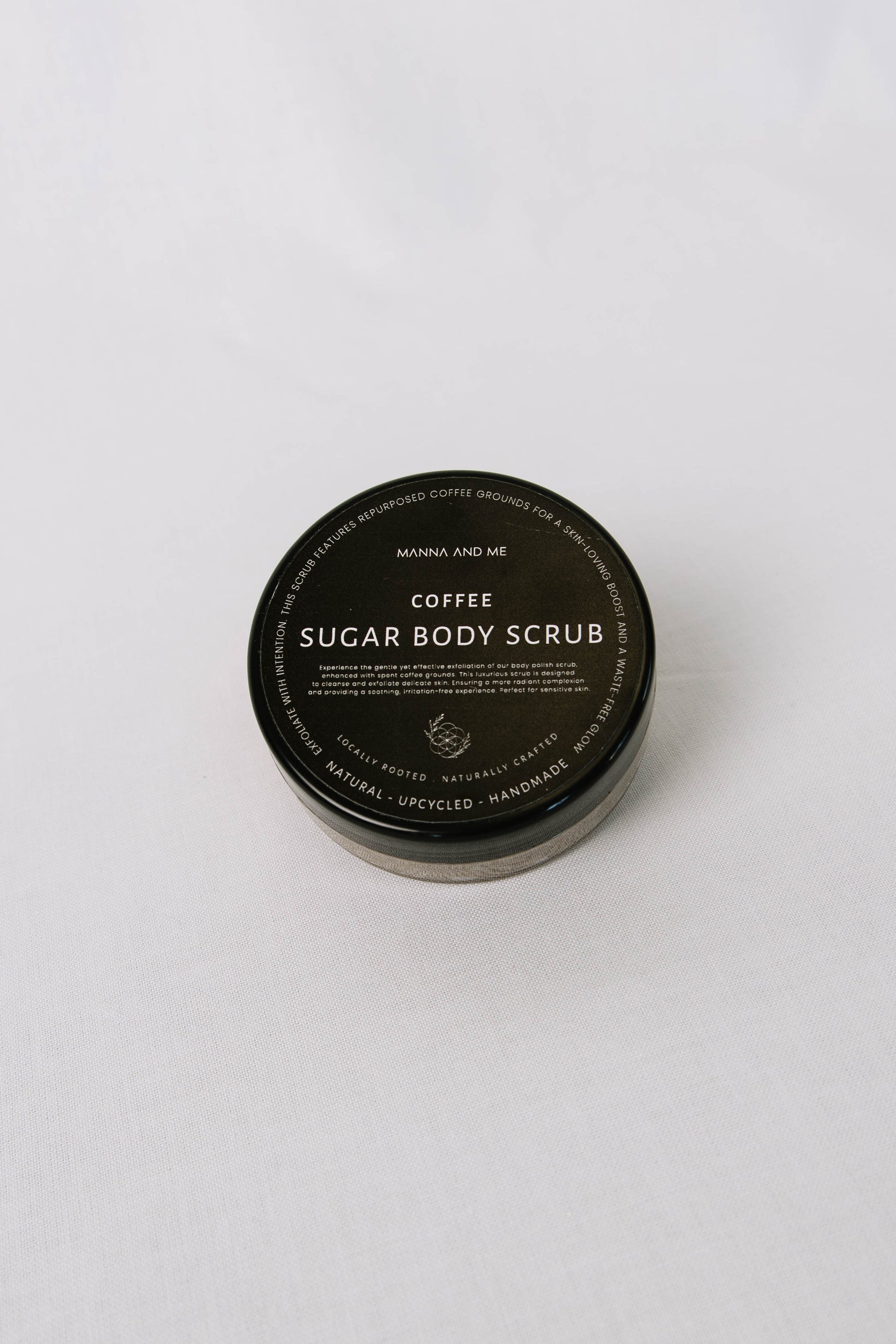 Manna and Me Sugar Body Polish Sugar & Coffee Scrub jar for gentle skin renewing exfoliation.